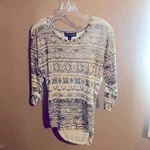 Gray white and cream patterned shirt. 3/4 sleeves. Longer in back.